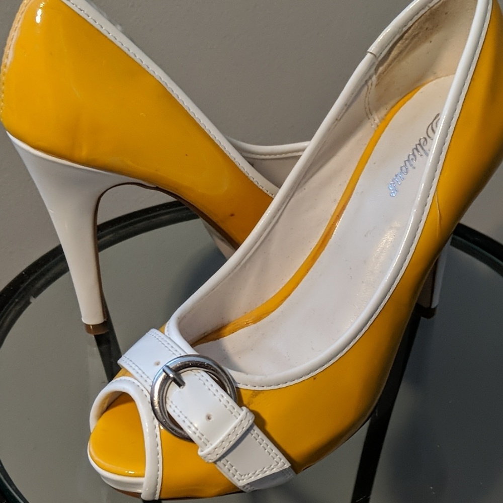Yellow and white patent leather heels
